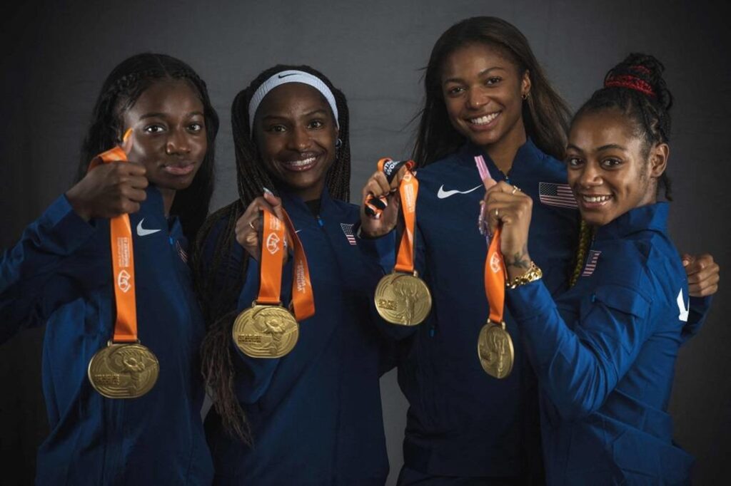 Women's 4x100m gold medallists USA's Tamari Davis, Twanisha Terry, Gabrielle Thomas and Sha'Carri Richardson pose for portraits during a studio photo session on the sidelines of the World Athletics Championships in Budapest on August 27, 2023. )