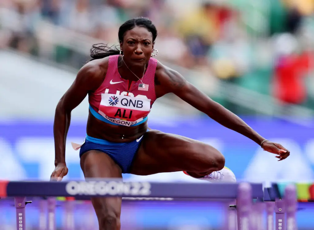 Ali soars over a hurdle