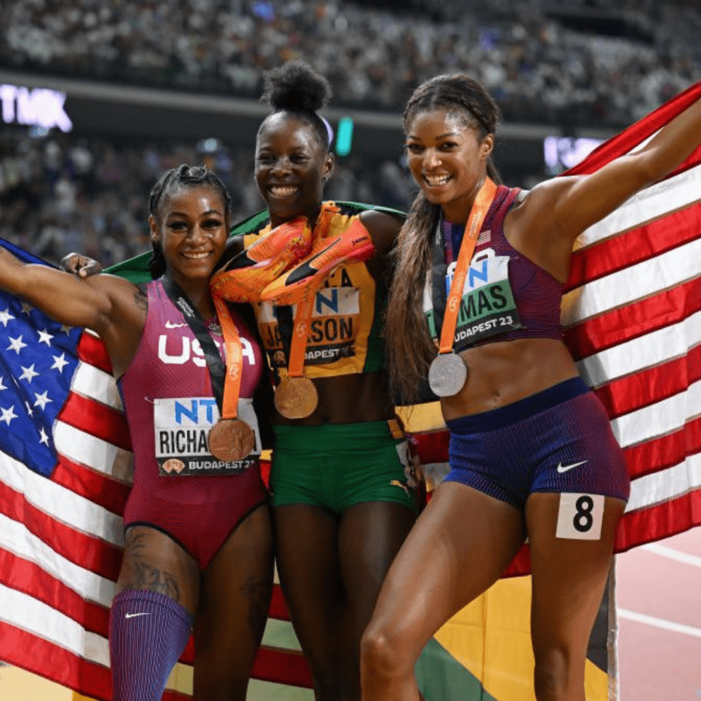 Richardson, Jackson and Thomas at the 2023 World Championships with their medals 