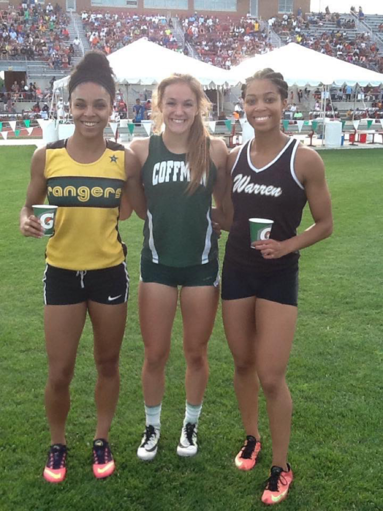 Long stands to the left, in high school at a track meet