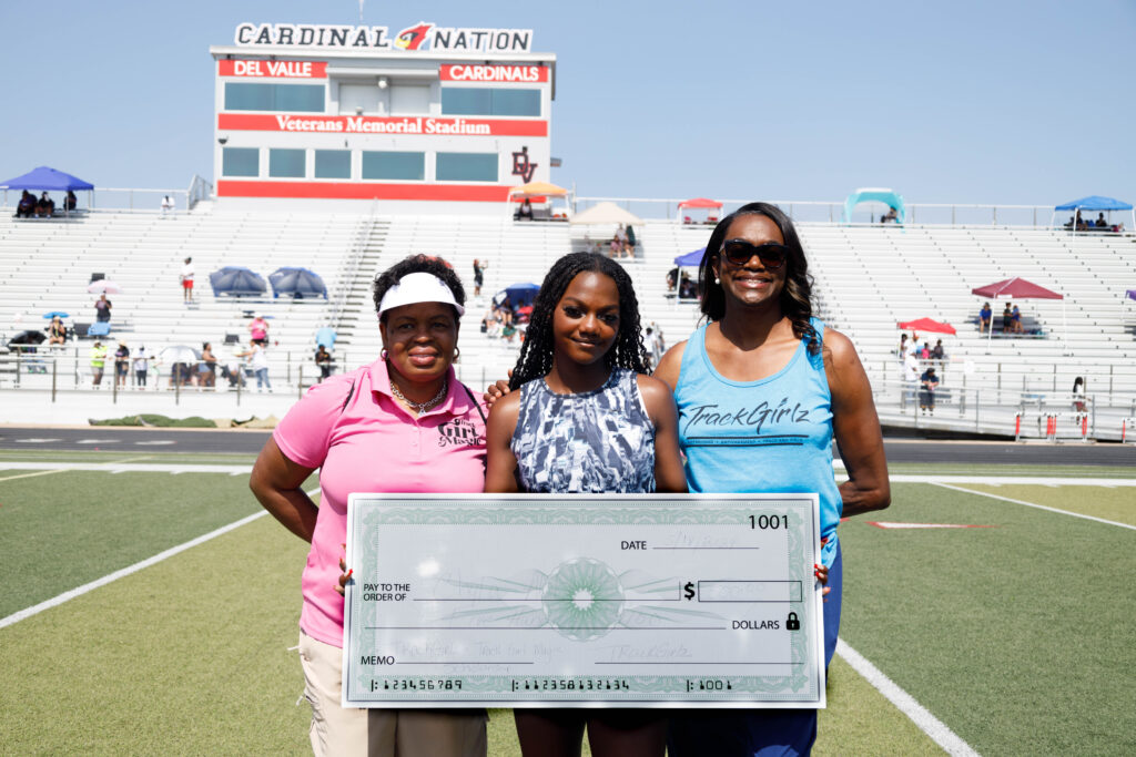 TrackGirl awarded a scholarship at a track meet