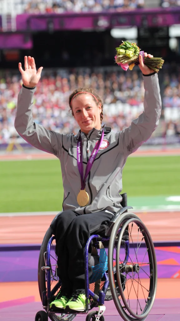 Tatyana McFadden, a wheelchair racer, with her medal 