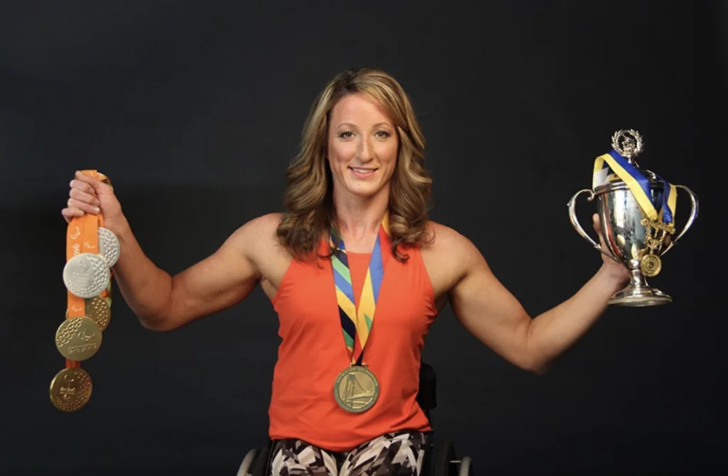 Tatyana McFadden holds her awards