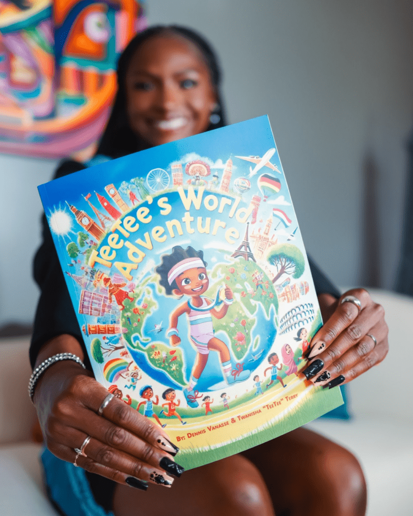 TeeTee Terry poses with her book 