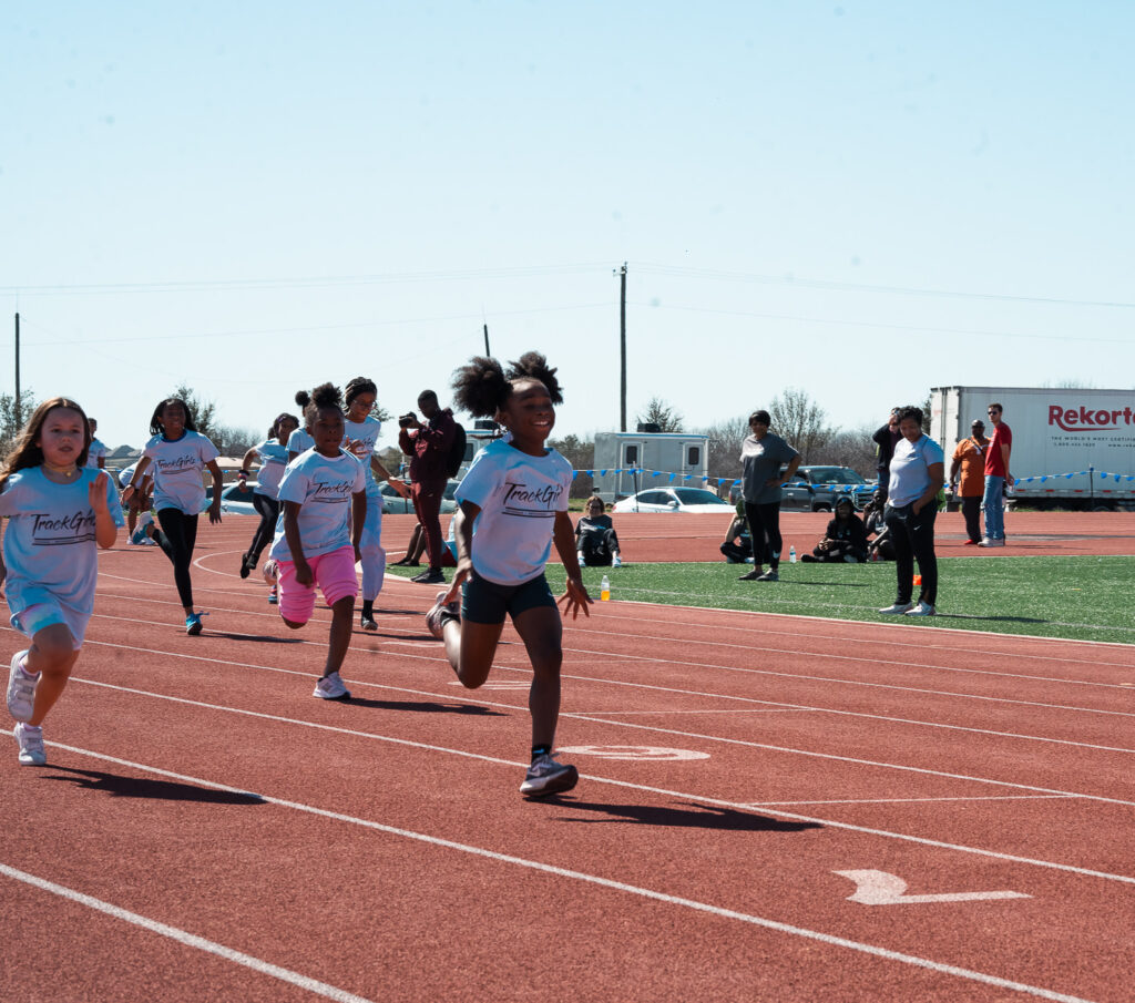 TrackGirlz running at a programming event