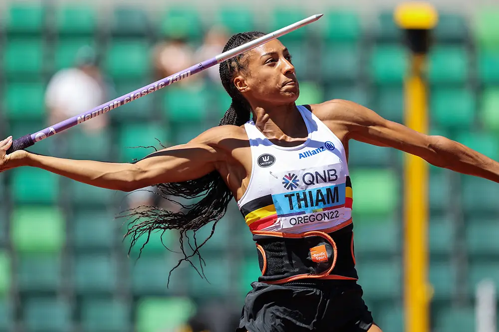 Thiam throws the javelin. 